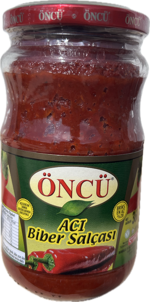 Jar of Oncu spicy pepper sauce with a red lid on a white background